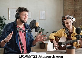Musical couple in recording studio