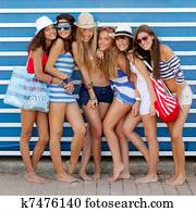 diverse group of girls going to beach on summer vacation diverse group of girls going to beach on summer vacation
