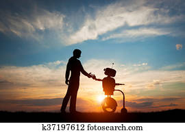 Man and robot meet and handshake. Concept of the future interaction with artificial intelligence