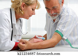 doctor with syringe is taking blood for test
