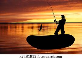 Fisherman with catching pike Fisherman with catching pike