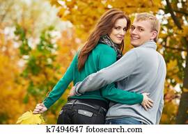 Couple at autumn outdoors