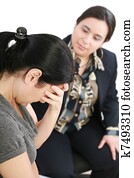 young woman in a conversation with a consultant or psychologist young woman in a conversation with a consultant or psychologist