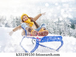 Child girl sledding Child girl sledding