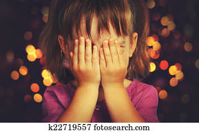 little girl  in anticipation of a Christmas miracle and a gift