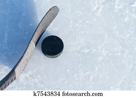 Hockey stick and puck Hockey stick and puck