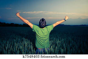 Young man enjoying his freedom/rejoicing from his success