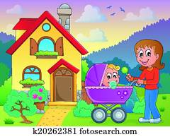 Mother with baby near house