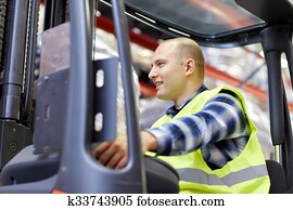 man operating forklift loader at warehouse man operating forklift loader at warehouse