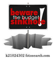 Beware the Budget Sinkhole Sign Hole Money Trouble Bankruptcy