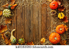 Harvest or Thanksgiving background with gourds and straw Harvest or Thanksgiving background with gourds and straw