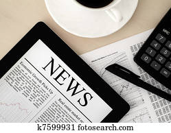 Tablet PC With News On Desk