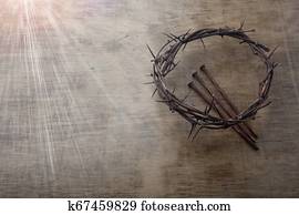 Jesus Crown Thorns and nails on Old and Grunge Wood Background. Vintage Retro Style. Free space for text