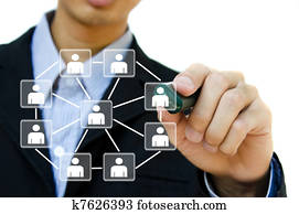 Young business drawing social network structure in a whiteboard. Young business drawing social network structure in a whiteboard.