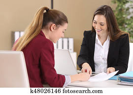 Employee or client signing a contract