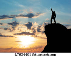 Man on top of mountain
