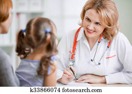 Family doctor consulting mother and kid Family doctor consulting mother and kid