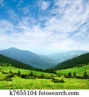 green mountain valley and sky