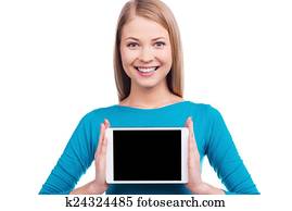 a, legtöbb, hasznos, thing., gyönyörű, young women, birtok, digital tabletta, és, mosolygós, időz, álló, ellen, fehér, háttér.