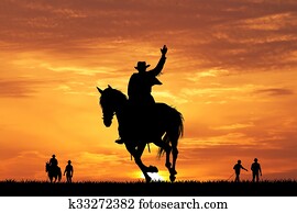 rodeo cowboy at sunset rodeo cowboy at sunset