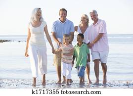 Extended family at the beach smiling