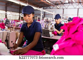 female factory worker sewing female factory worker sewing