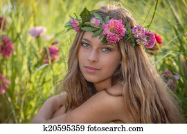 natural beauty and health, woman with flowers in hair. natural beauty and health, woman with flowers in hair.