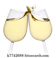 Merry Christmas and happy New year. Pair of champagne flutes making a toast, isolated on white background. Merry Christmas and happy New year. Pair of champagne flutes making a toast, isolated on white background.
