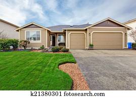 House exterior. View of entrance porch and driveway