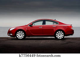 Side view of cherry red car Side view of cherry red car