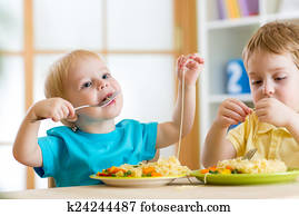 children eating in kindergarten children eating in kindergarten