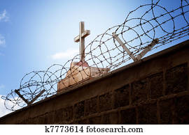 War and religion concept - Cross and barbed wire