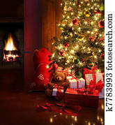 Christmas scene with tree and fire in background
