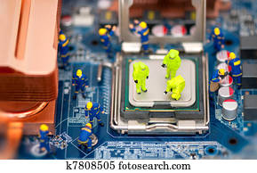 Group of technicians repair computer Group of technicians repair computer