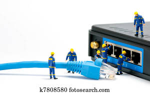 Technicians connecting network cable Technicians connecting network cable