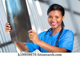 african american healthcare worker with x-ray