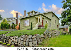 Craftsman green cute house exterior front.