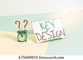 Handwriting text Key Design. Concept meaning a necessary or very important realization of a concept or idea Mini size alarm clock beside a Paper sheet placed tilted on pastel backdrop. Handwriting text Key Design. Concept meaning a necessary or very important realization of a concept or idea Mini size alarm clock beside a Paper sheet placed tilted on pastel backdrop.