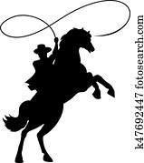 Cowboy silhouette with lasso on horse Cowboy silhouette with lasso on horse