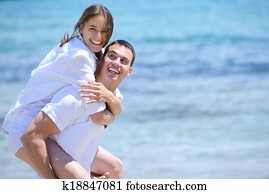 happy couple have fun on the beach happy couple have fun on the beach