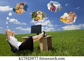 Businesswoman Day Dreaming in Green Field Office