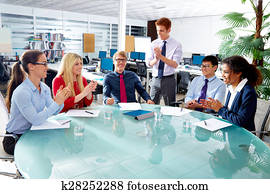 Executive business team clapping hands meeting