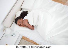 Above view of a woman sleeping