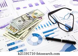 dollar currency on graphs, financial planning and expense report