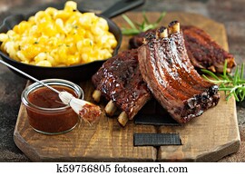 Grilled and smoked ribs with barbeque sauce Grilled and smoked ribs with barbeque sauce