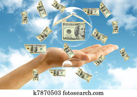 Money house in hand