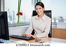 Female Entrepreneur Working On Computer Female Entrepreneur Working On Computer