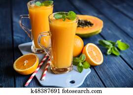 Healthy papaya, orange and mango smoothie Healthy papaya, orange and mango smoothie