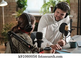 Two colleagues working on radio