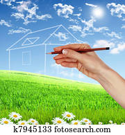 House from white clouds against blue sky